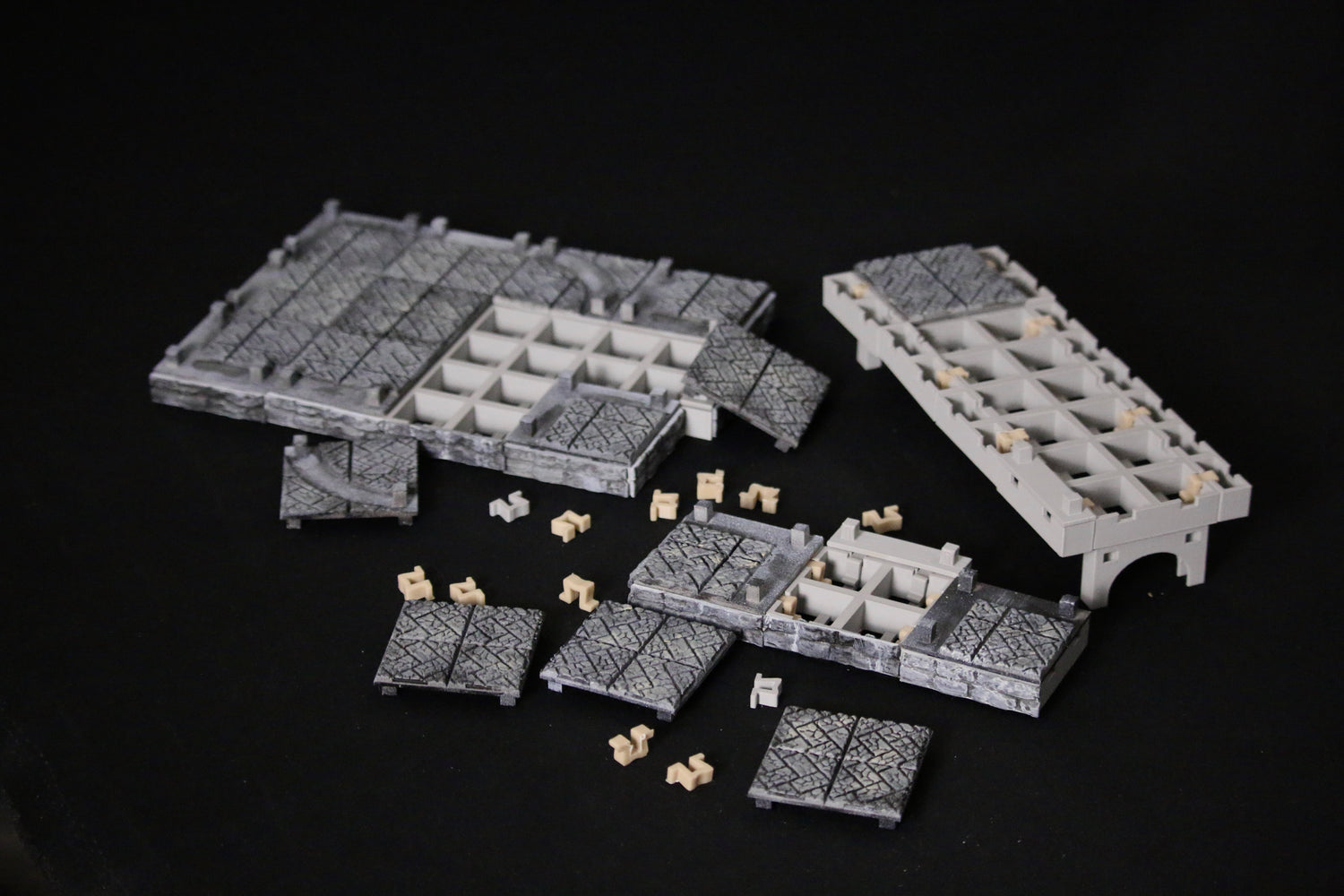 Omega Terrain foundations being built using the Omega Clip, tiles and frames